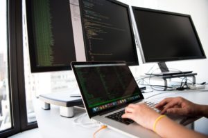 person typing python codes